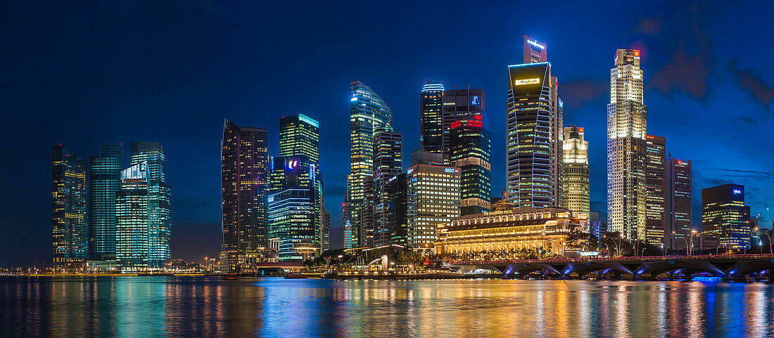 Skyscrapers in Singapore city skyline illuminated at night, Singapore, Singapore, Singapore, Singapore