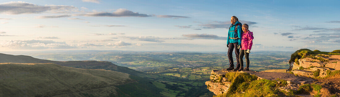 Panoramic view of hikers overlooking remote landscape, Rural, None, UK