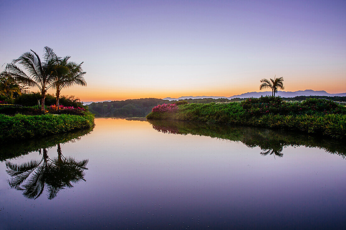 Sky reflected in still tropical lake, Puerto Vallarta, Jalisco, Mexico