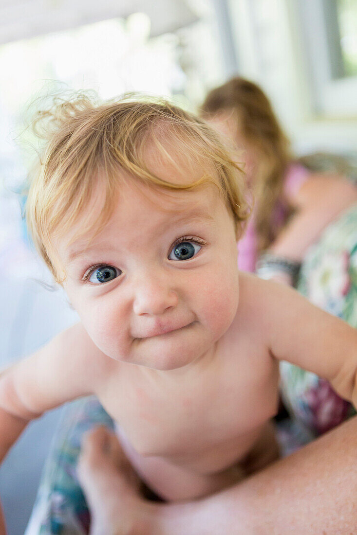 Caucasian baby grimacing, Brunswick, Georgia, USA