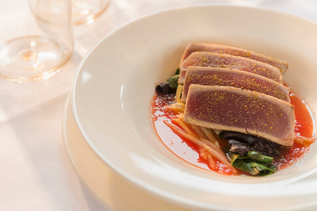 Plate of sliced meat with vegetables, C1