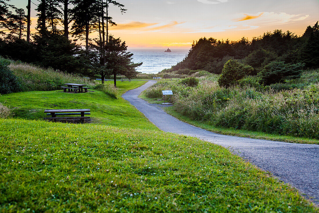 Path in park overlooking sunset and ocean, Cannon Beach, Oregon, United States