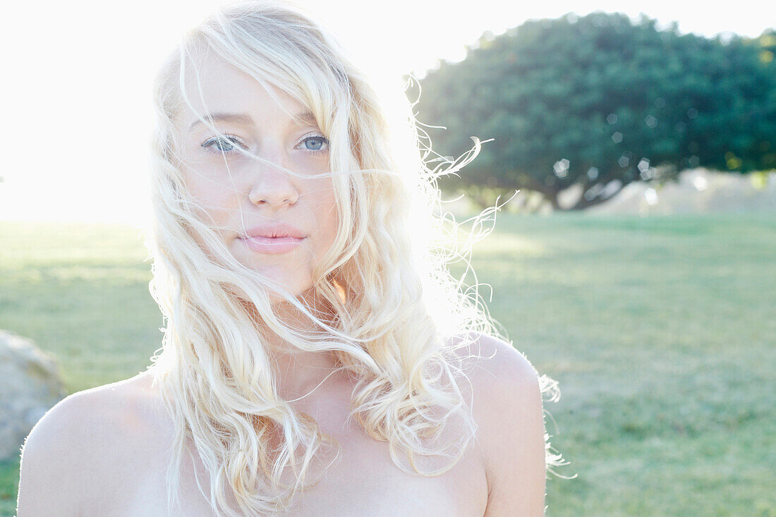 Caucasian woman standing in field, Los Angeles, California, USA