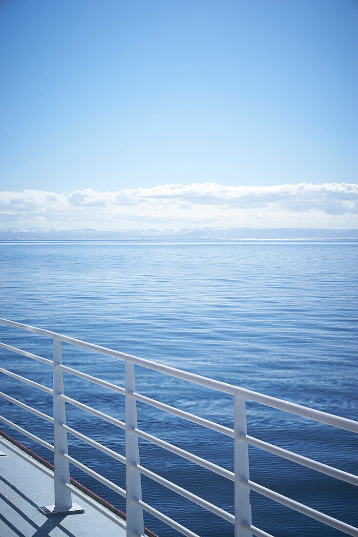 White railing overlooking seascape, unknown, unknown, Iceland