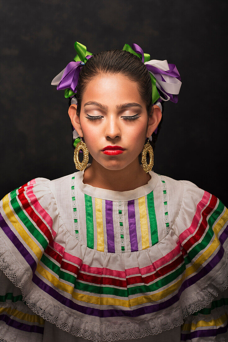 Hispanic teenage girl wearing Sinaloa Folkloric dress, Petaluma, California, United States