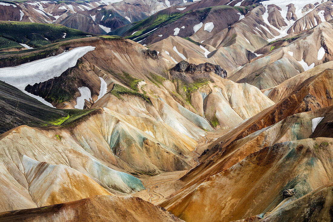 Snowy mountains and rhyolite formations in remote landscape, Landmannalaugar, Iceland, Iceland