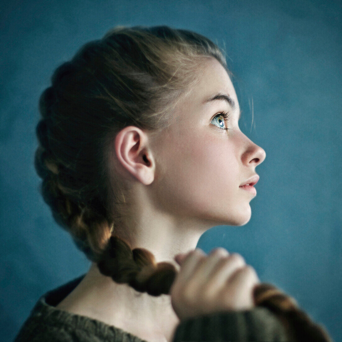 Teenage girl holding braid, Nizniy Tagil, Sverdlovsk, Russia
