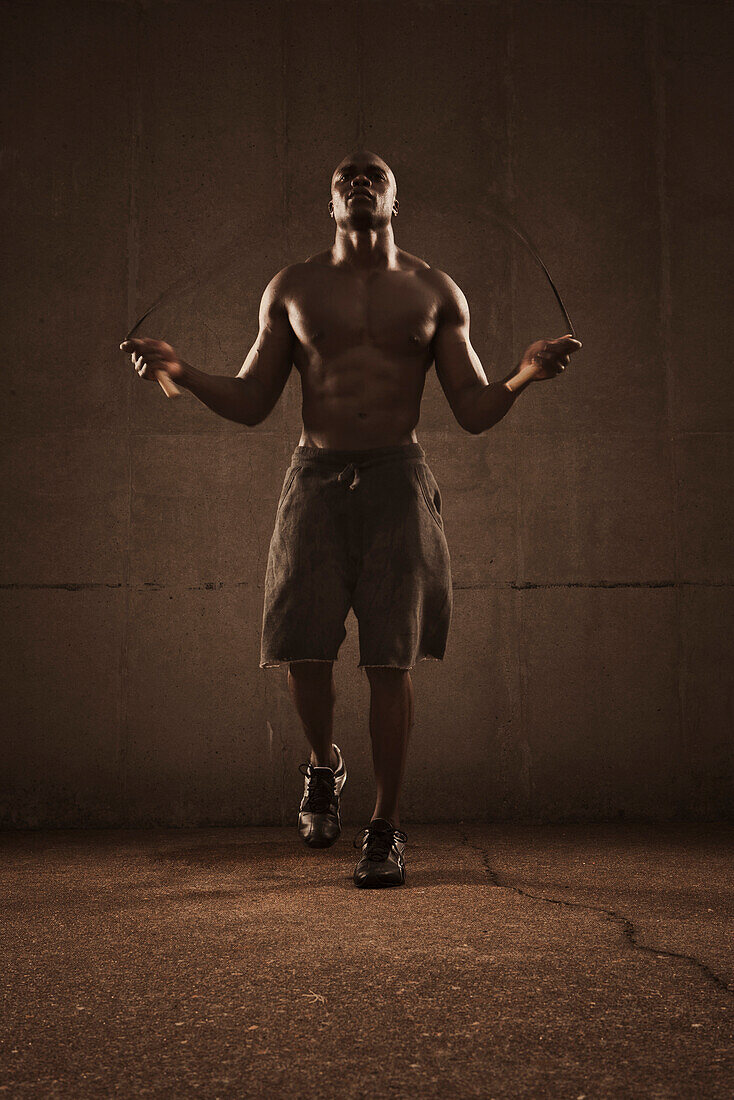 African American man jumping rope, Saint Louis, MO, USA