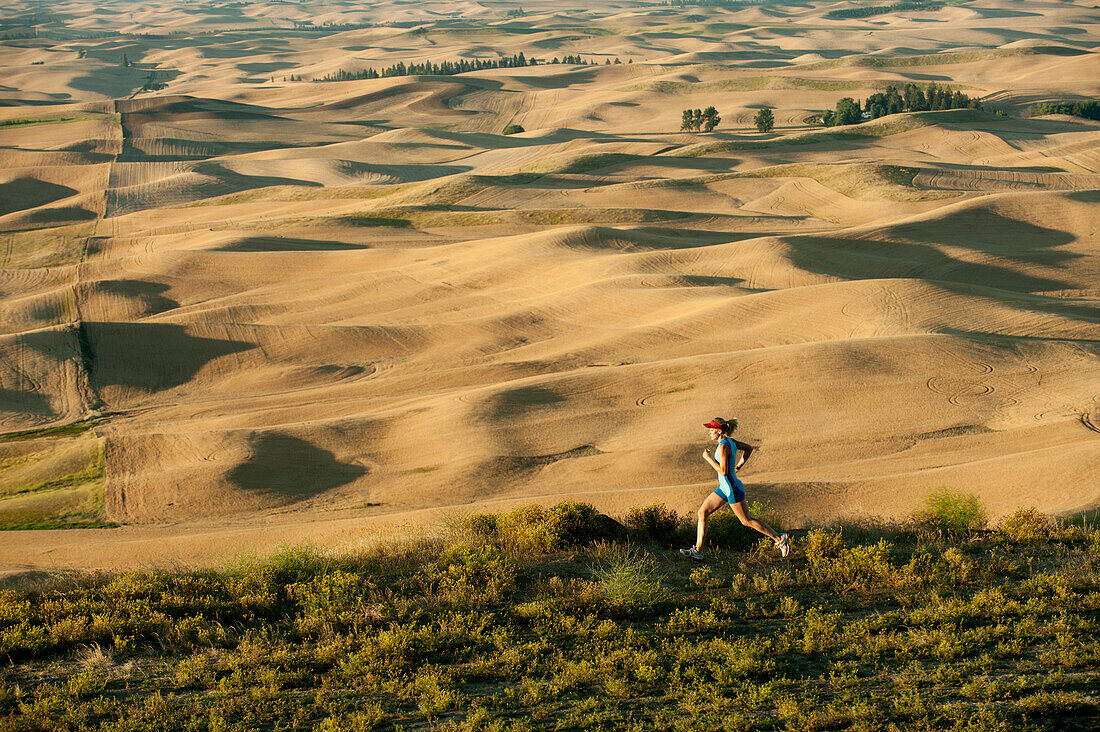 Caucasian woman running in remote area, Bainbridge Island, WA, USA