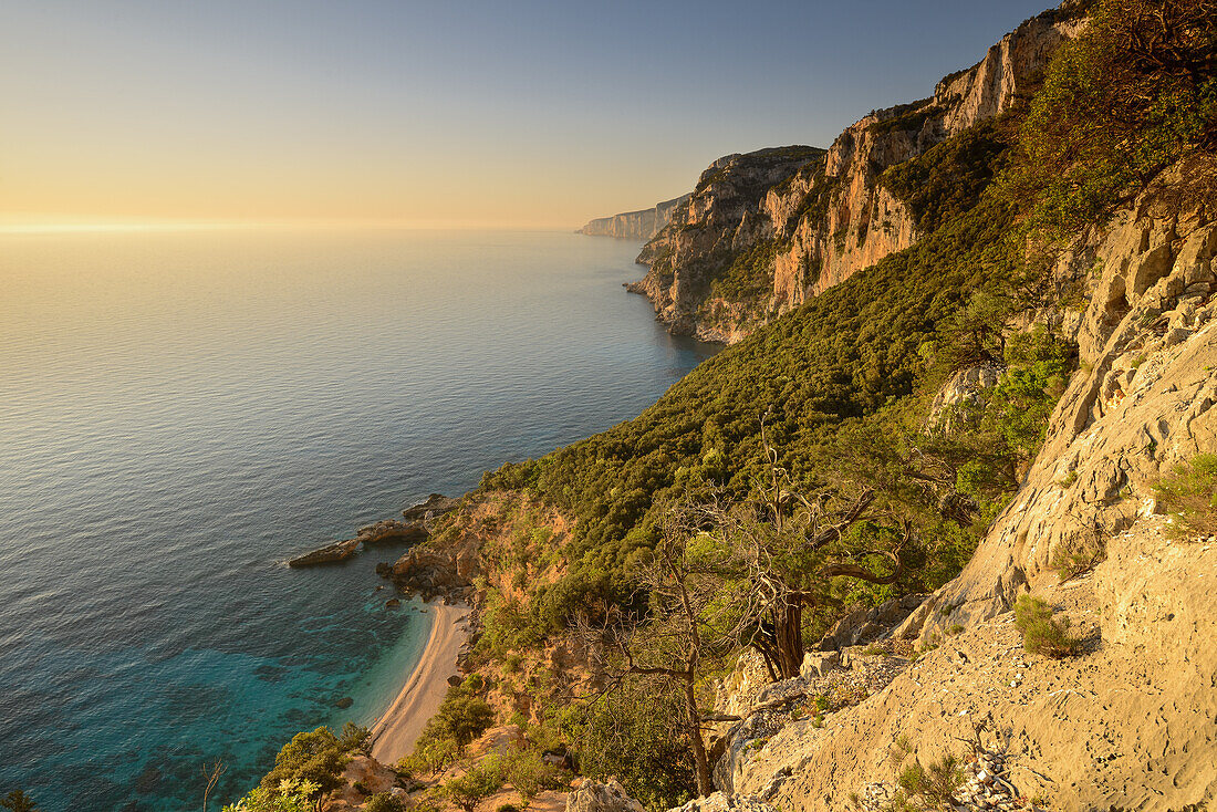 Sunrise above the beach of the bay Cala Biriola, Golfo di Orosei, Selvaggio Blu, Sardinia, Italy, Europe