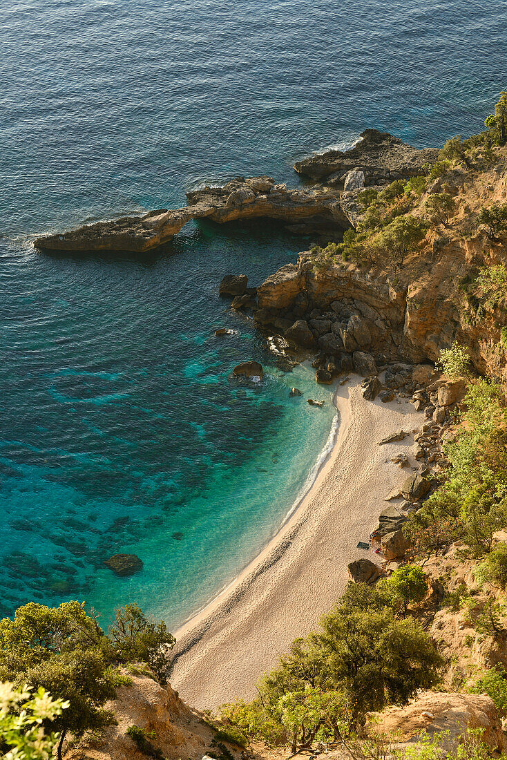 Sunrise above the beach of the bay Cala Biriola, Golfo di Orosei, Selvaggio Blu, Sardinia, Italy, Europe