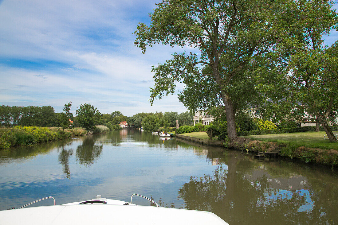 Bow of houseboat on the river Leie, near Sint-Martens-Latem, Flemish Region, Belgium