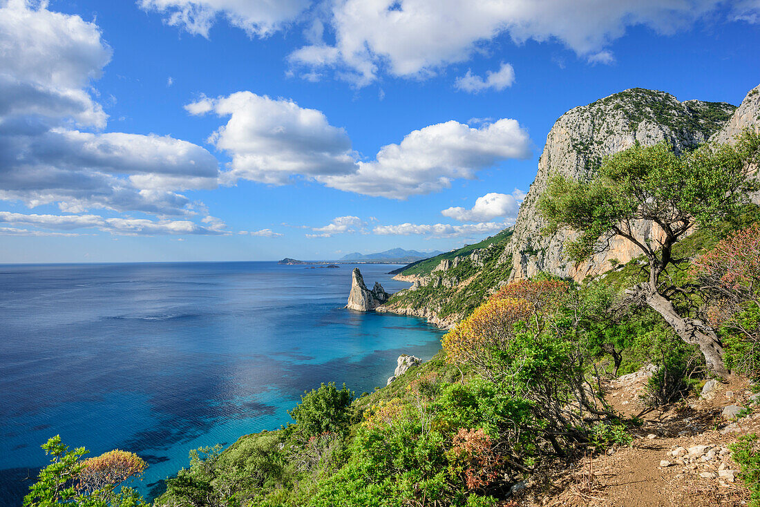 Coast at Golfo di Orosei with rock spire Pedra Longa, Selvaggio Blu, National Park of the Bay of Orosei and Gennargentu, Sardinia, Italy