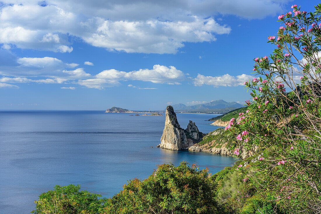 Coast at Golfo di Orosei with rock spire Pedra Longa, Selvaggio Blu, National Park of the Bay of Orosei and Gennargentu, Sardinia, Italy