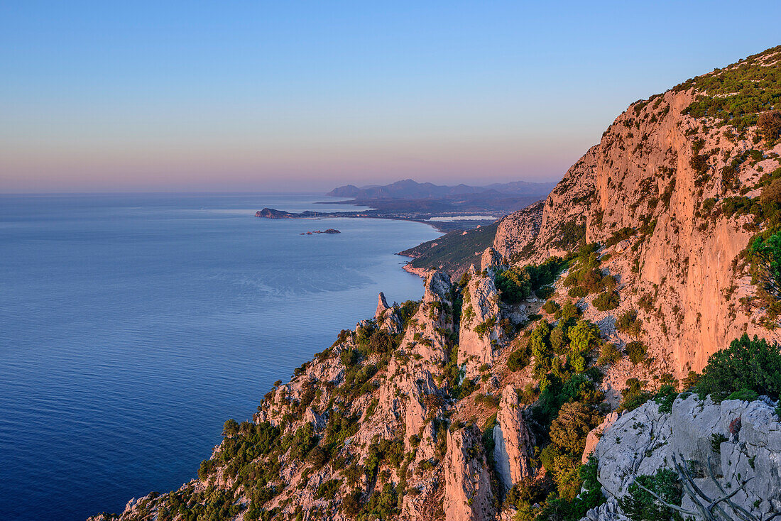 View to Golfo di Orosei with rock spire Pedra Longa, Selvaggio Blu, National Park of the Bay of Orosei and Gennargentu, Sardinia, Italy