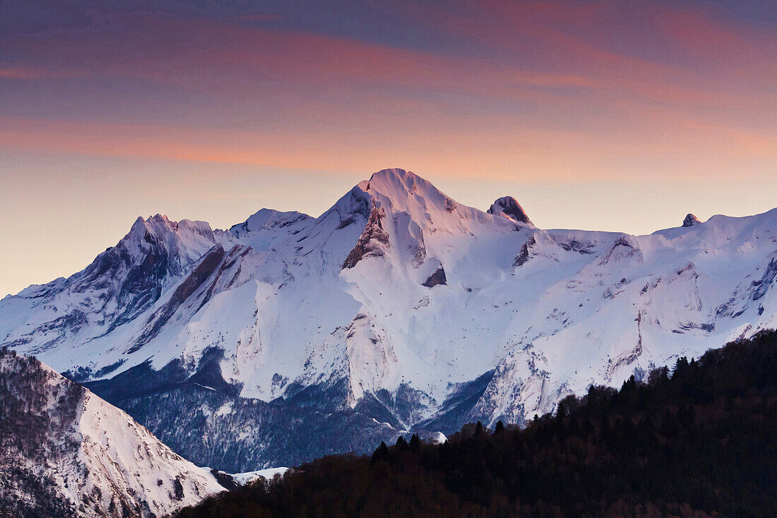 France, Aquitaine, Pyrenees Atlantiques, Twilight on the peak and Ger massif in winter, Ossau valley