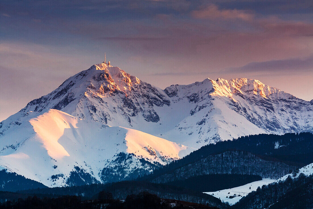 France, Midi Pyrenees, Hautes Pyrenees, Sunset on the Pic du Midi de Bigorre seen from the foothills near Lourdes