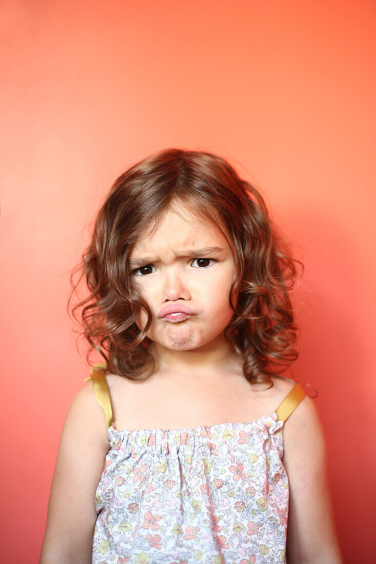 Portrait of a 4 years old girl pouting
