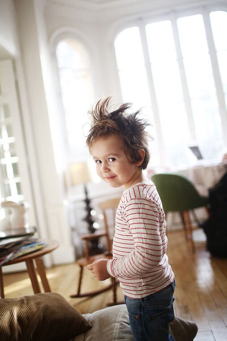 Little boy with his hair in a mess