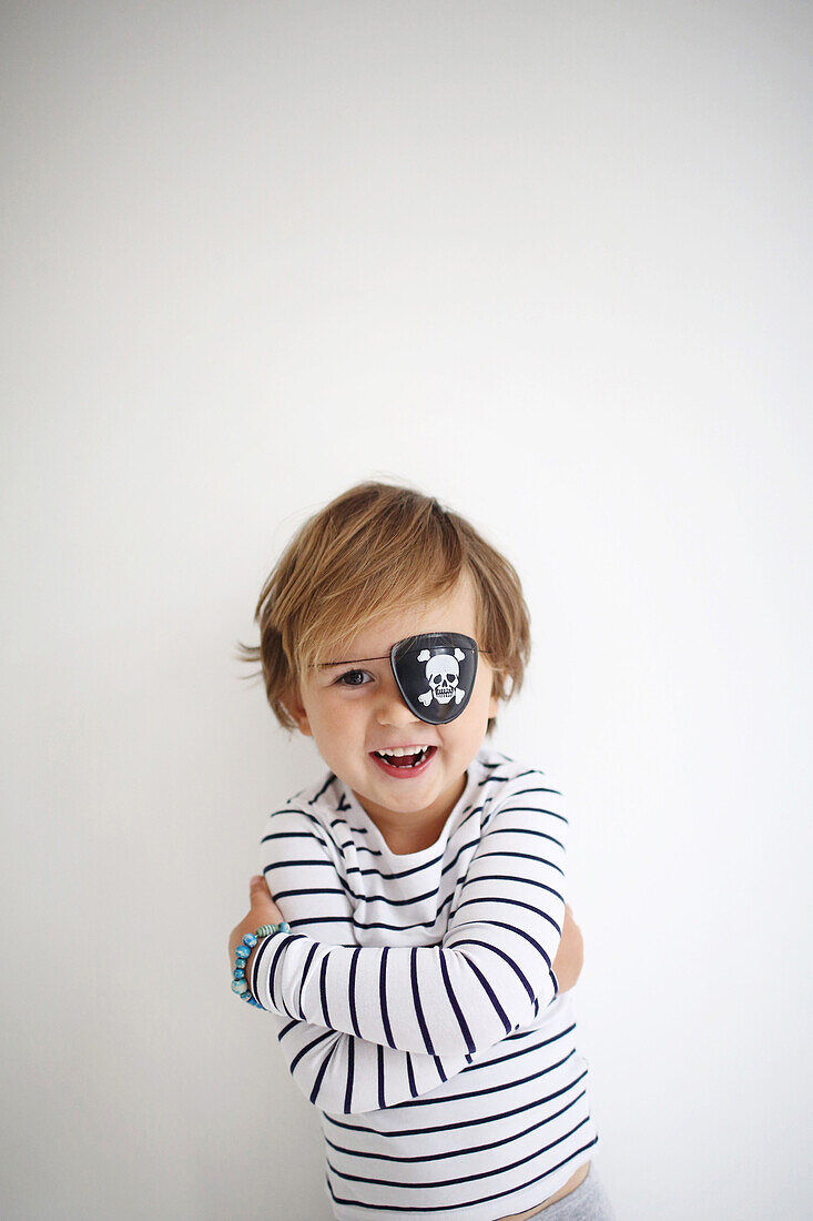 Portrait of boy wearing pirate costume