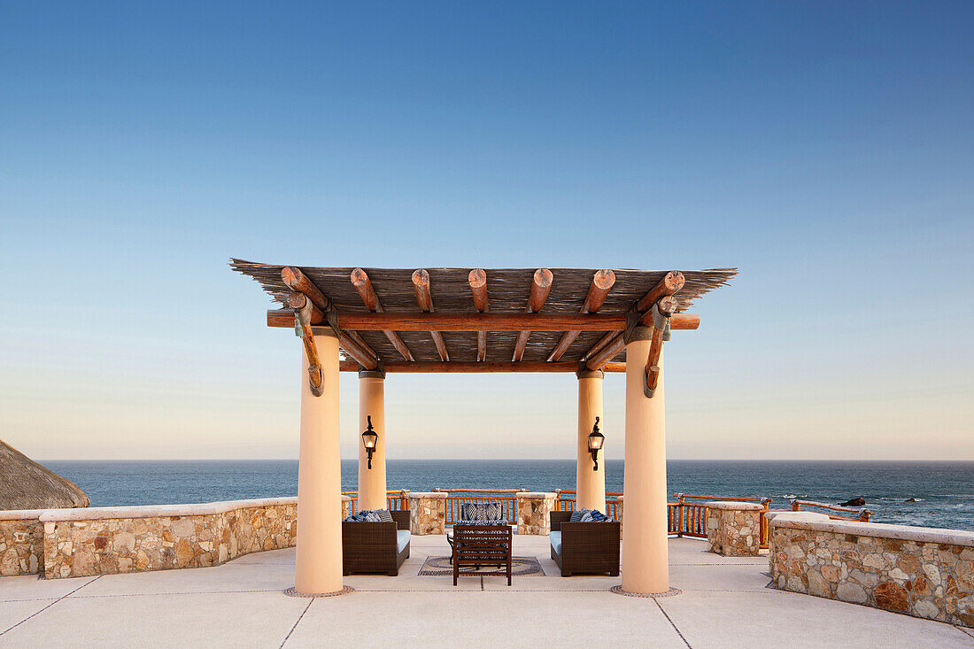 Thatched roof patio overlooking ocean, Cabo San Lucas, BCS, Mexico
