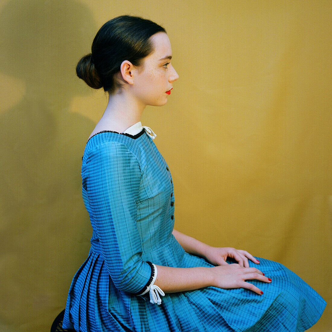 Teenage Girl with Red Lips in Blue Dress, Profile