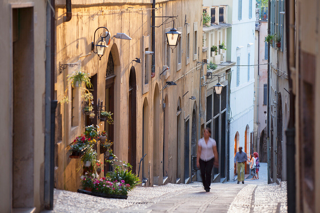 People walking along street, Spoleto, Umbria, Italy, Europe