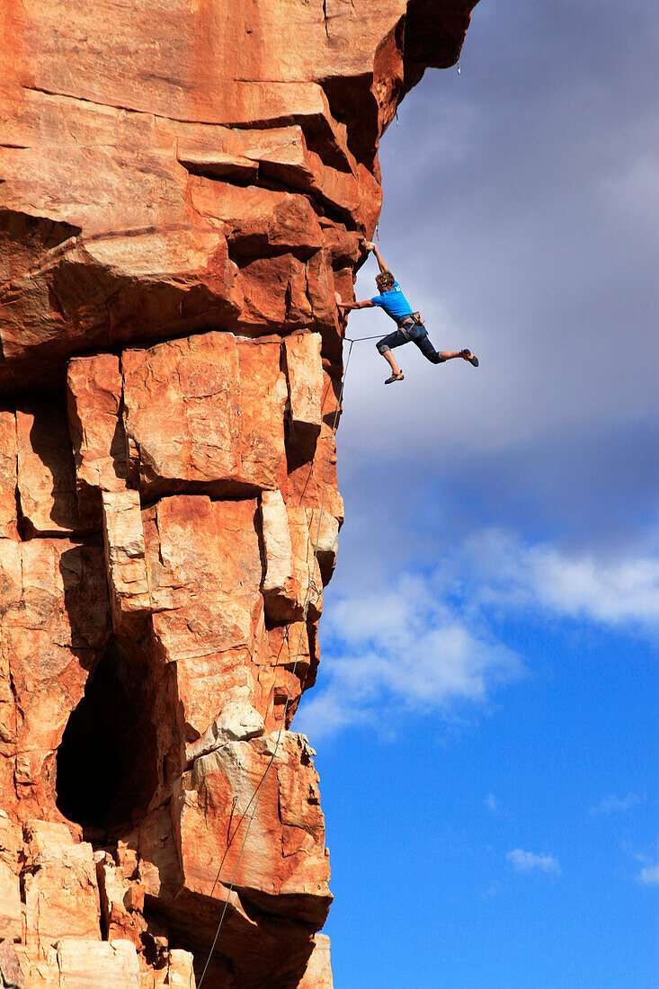 A climber on the sandstone cliffs of the Cederberg Mountains, Western Cape, South Africa, Africa