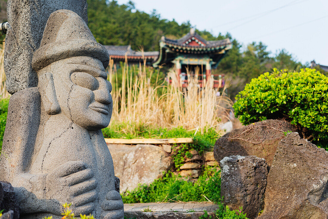 Dol hareubang (harubang) protection and fertility statue at Sanbanggulsa Temple, Jeju Island, South Korea, Asia