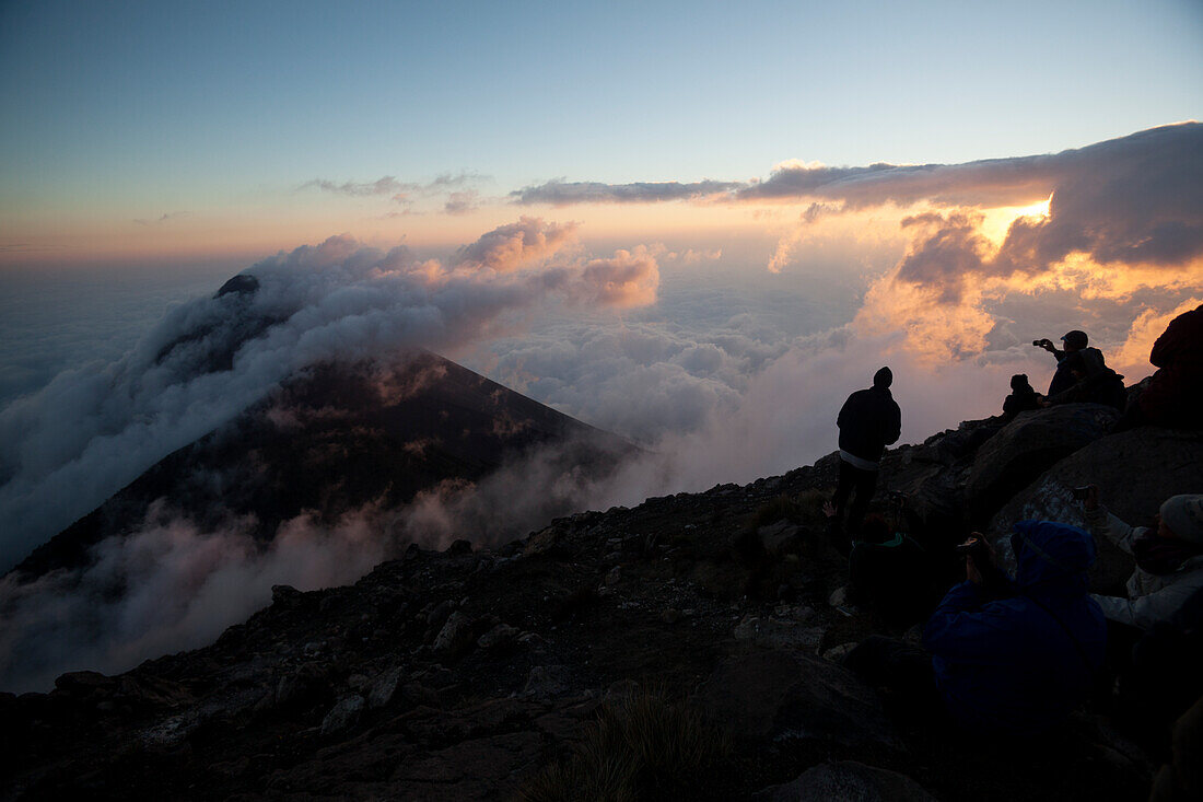Tourists enjoying the view, Volcan Fuego, Guatemala, Central America