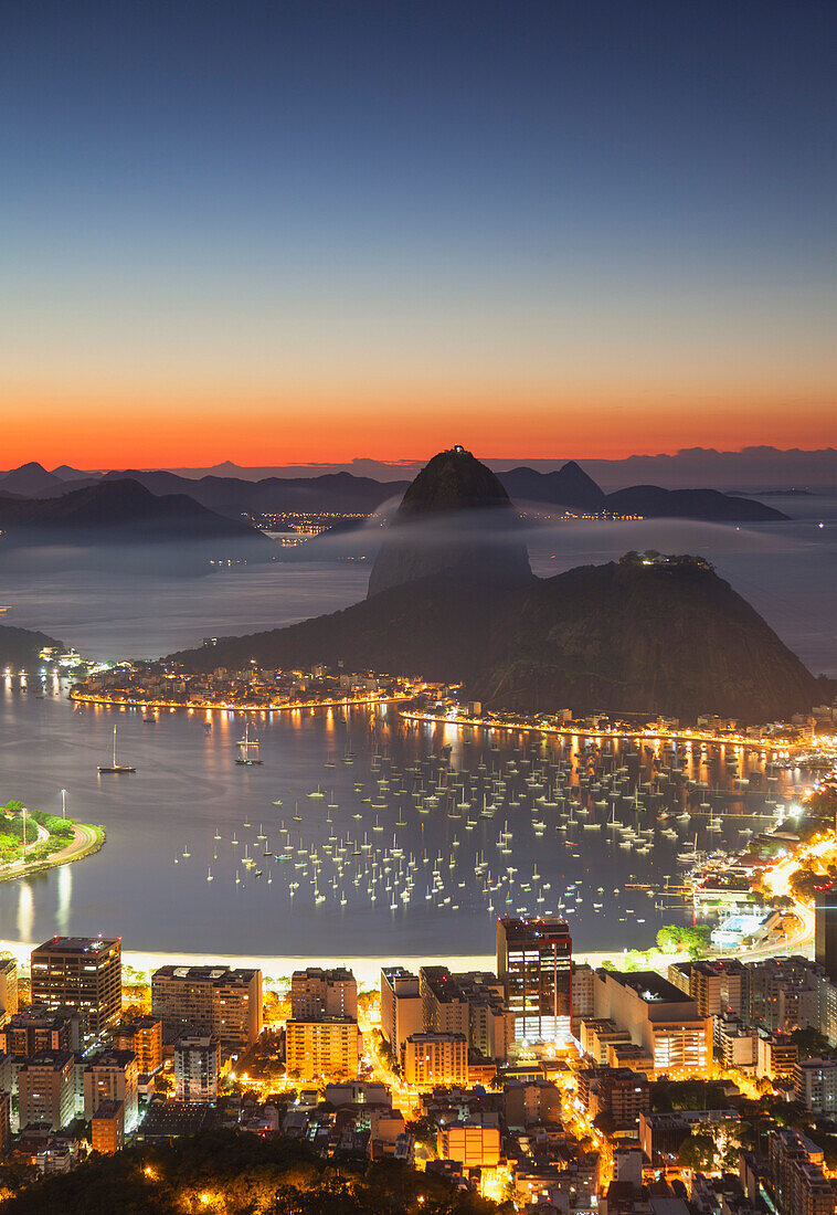 View of Sugarloaf Mountain and Botafogo Bay at dawn, Rio de Janeiro, Brazil, South America