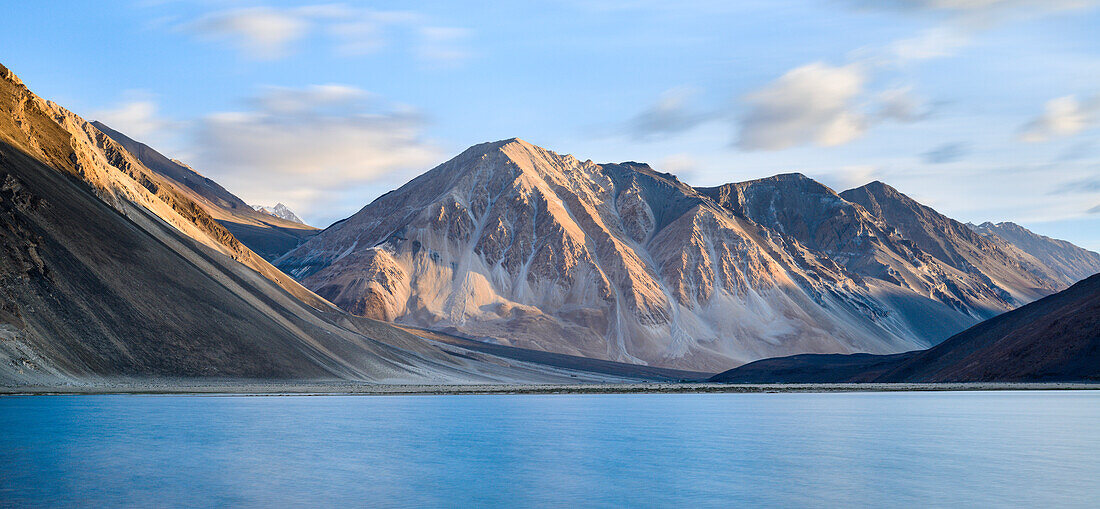 First light on the mountains flanking the lake of Tso Pangong, Ladakh, India, Asia