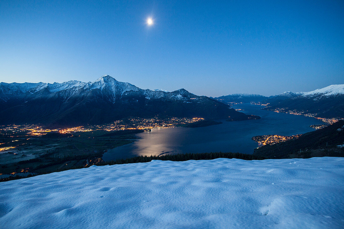 Lake Como and its many villages under a full moon, Lombardy, Italy, Europe