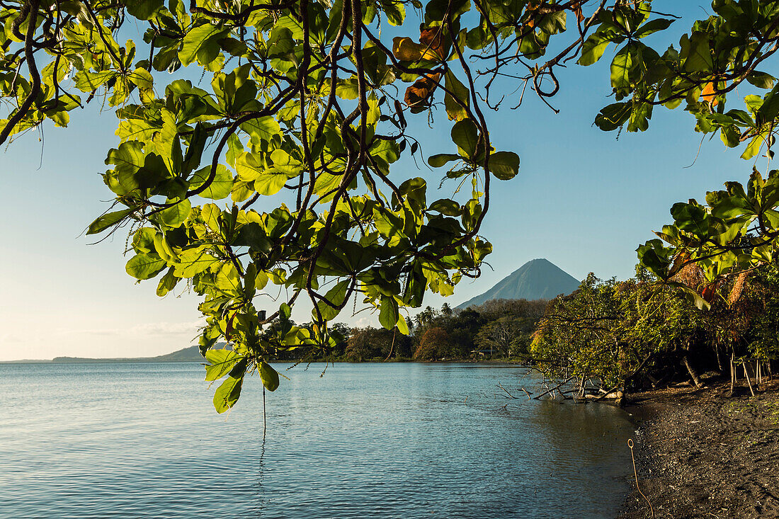 Lakeside scene and Volcan Concepcion at Merida in island's South East, Merida, Volcan Maderas, Omotepe Island, Lake Nicaragua, Nicaragua, Central America