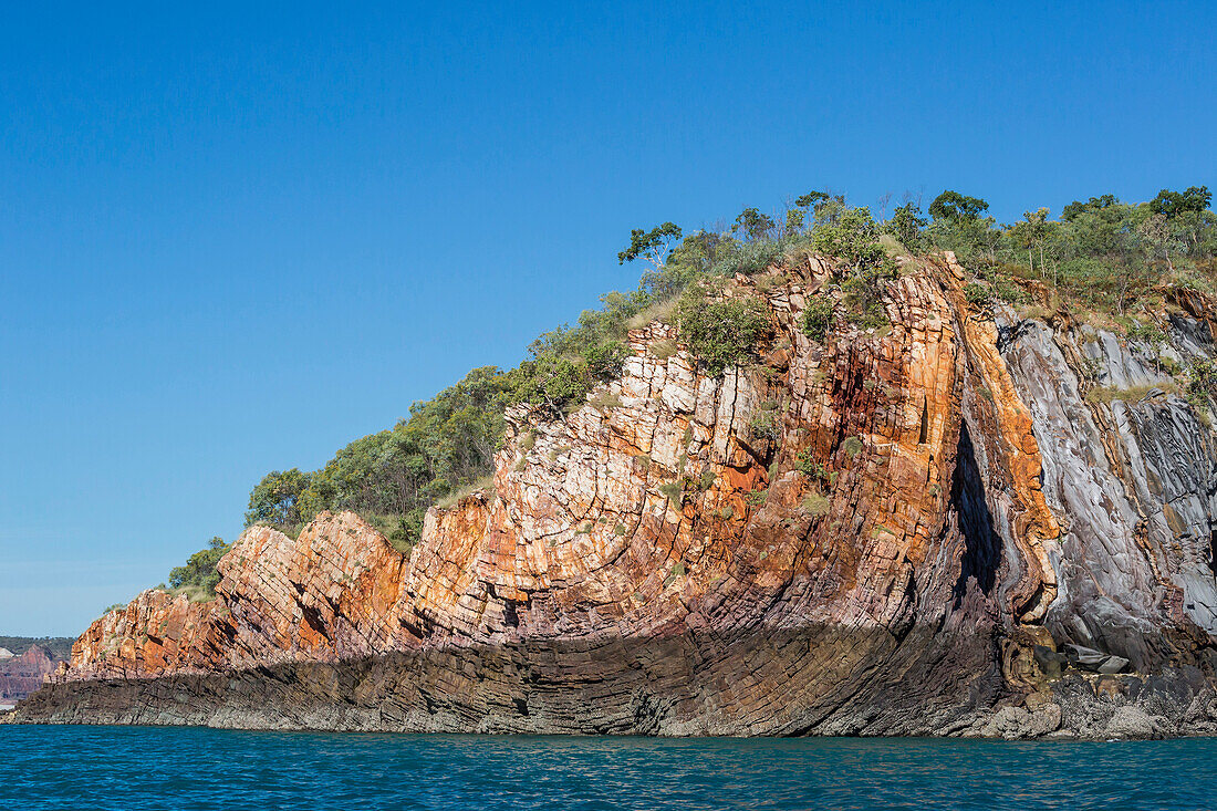 The 1.7 billion year old Elgee sandstone cliffs in Yampi Sound, Kimberley, Western Australia, Australia, Pacific