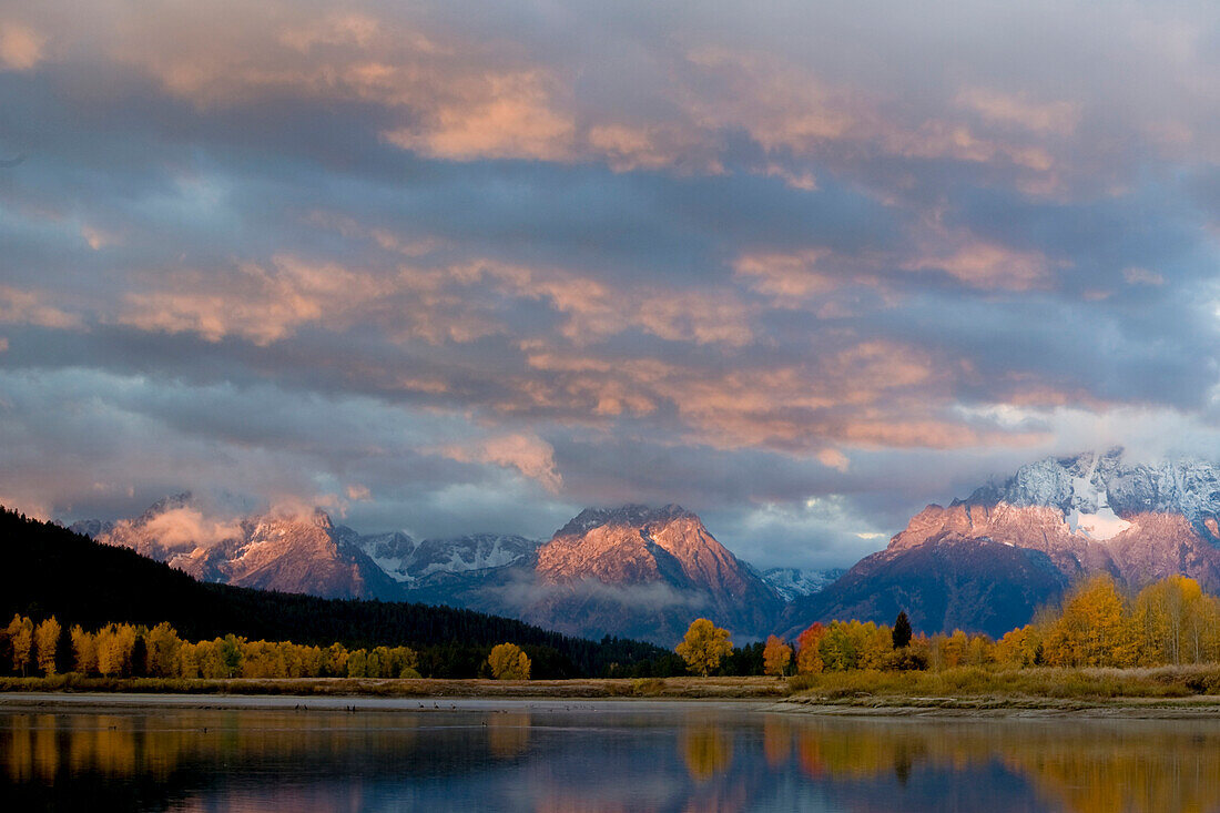 Morning light illuminates the Tetons in Grand Teton National Park, Wyoming.