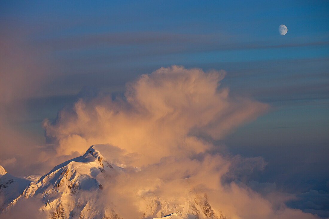A storm brewing over Mount Hunter, as seen from 14.000 feet camp on Mount McKinley, also know as Denali, Alaska.     Mount McKinley, (native name Denali) is the highest mountain peak in North America, with a summit elevation of 20,321 feet (6,194 m) above