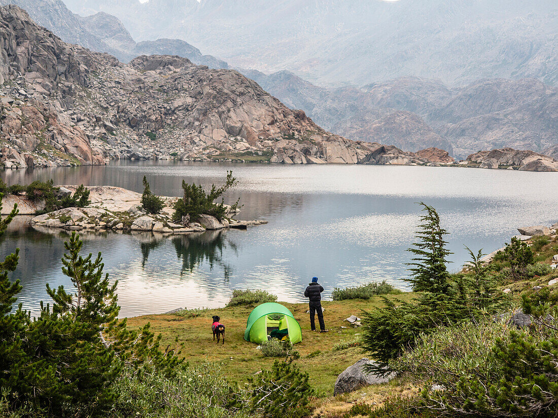 Camping next to an alpine lake.