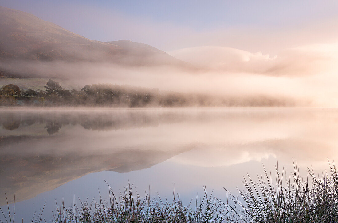 Misty morning over Loweswater in autumn in the Lake District National Park, Cumbria, England, United Kingdom, Europe