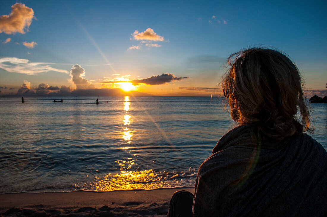 Woman watching the sunset in Guam, US Territory, Central Pacific, Pacific
