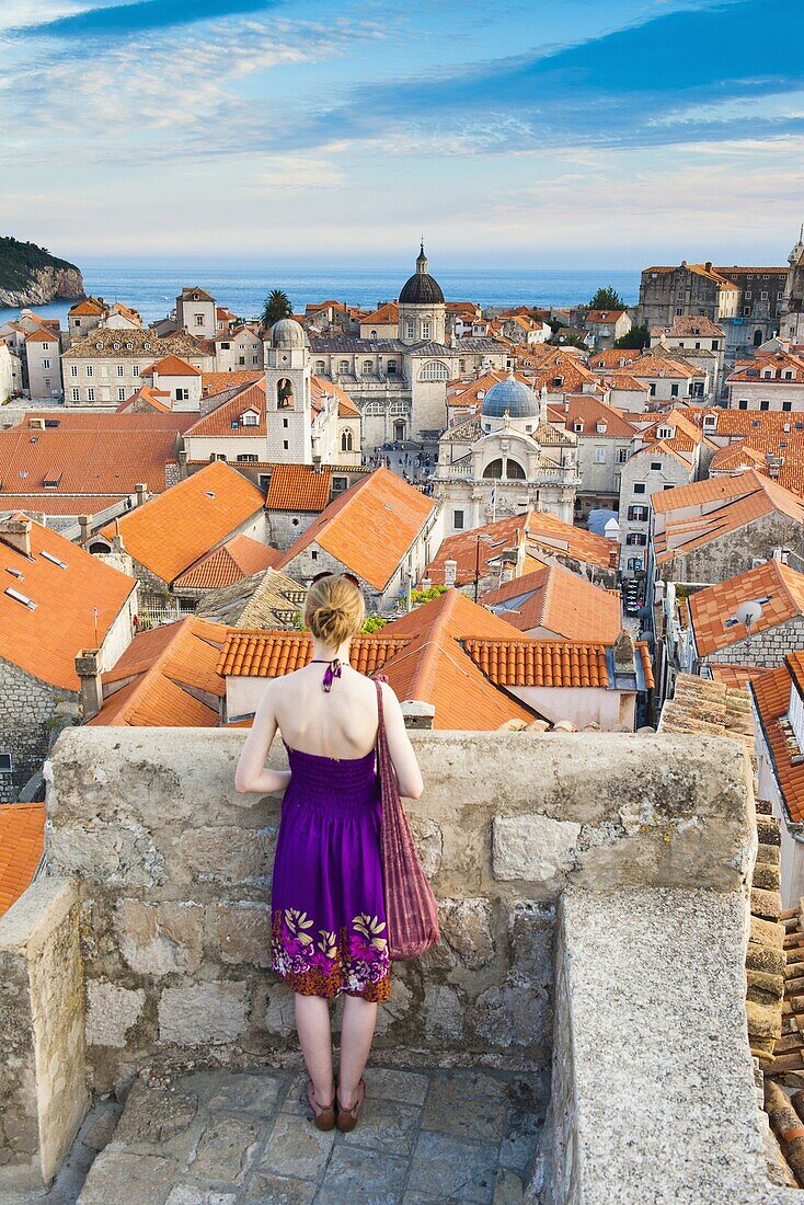 Tourist sightseeing on Dubrovnik City Walls, Old Town, UNESCO World Heritage Site, Dubrovnik, Dalmatian Coast, Croatia, Europe