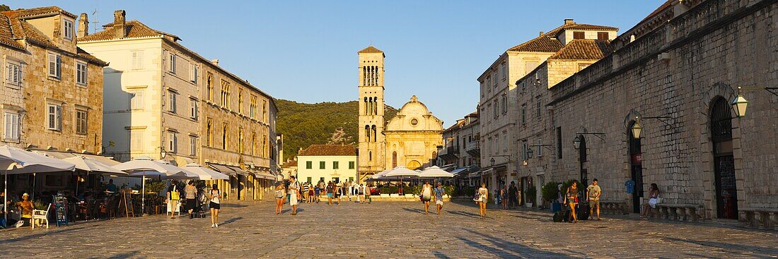 Tourists in St. Stephens Square, Hvar Town, Hvar Island, Dalmatian Coast, Croatia, Europe