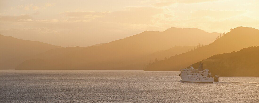 Queen Charlotte Sound at sunset, the Interislander ferry between Picton, South Island and Wellington, North Island, New Zealand, Pacific