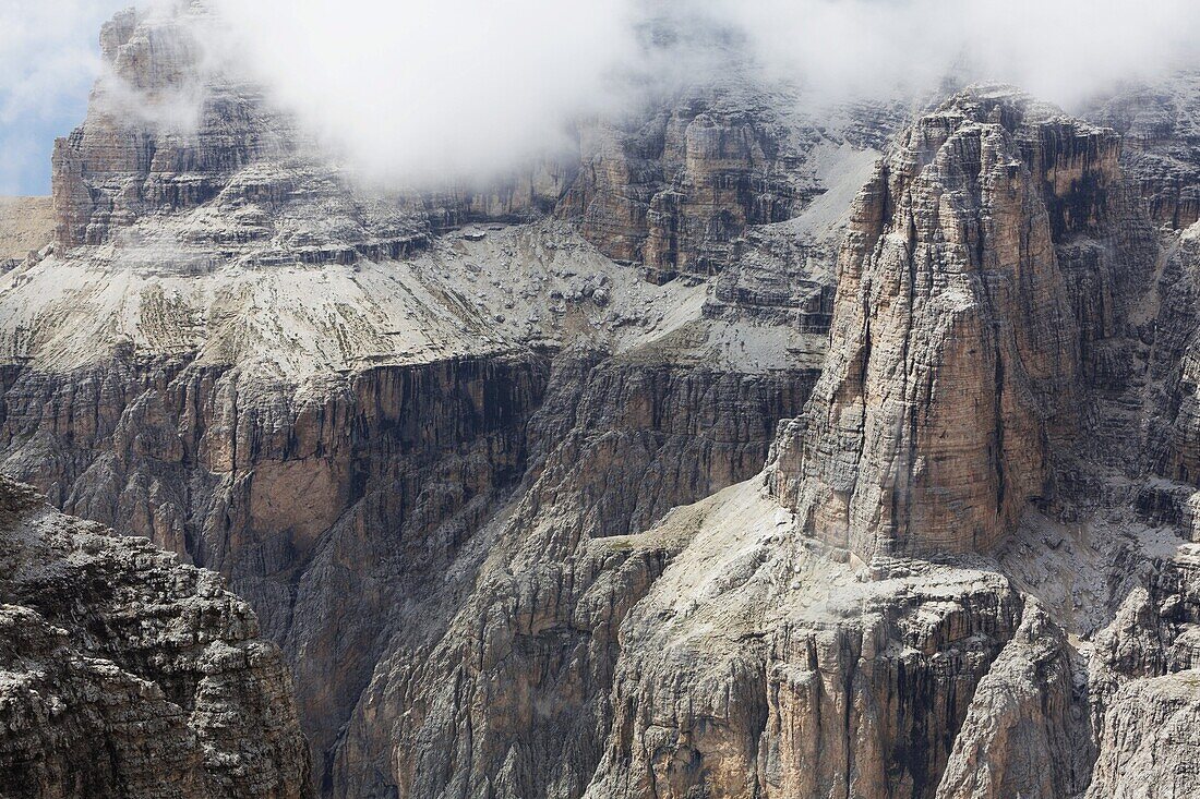 Cloud on the dramatic Sass Pordoi mountain in the Dolomites near Canazei, Trentino-Alto Adige, Italy, Europe