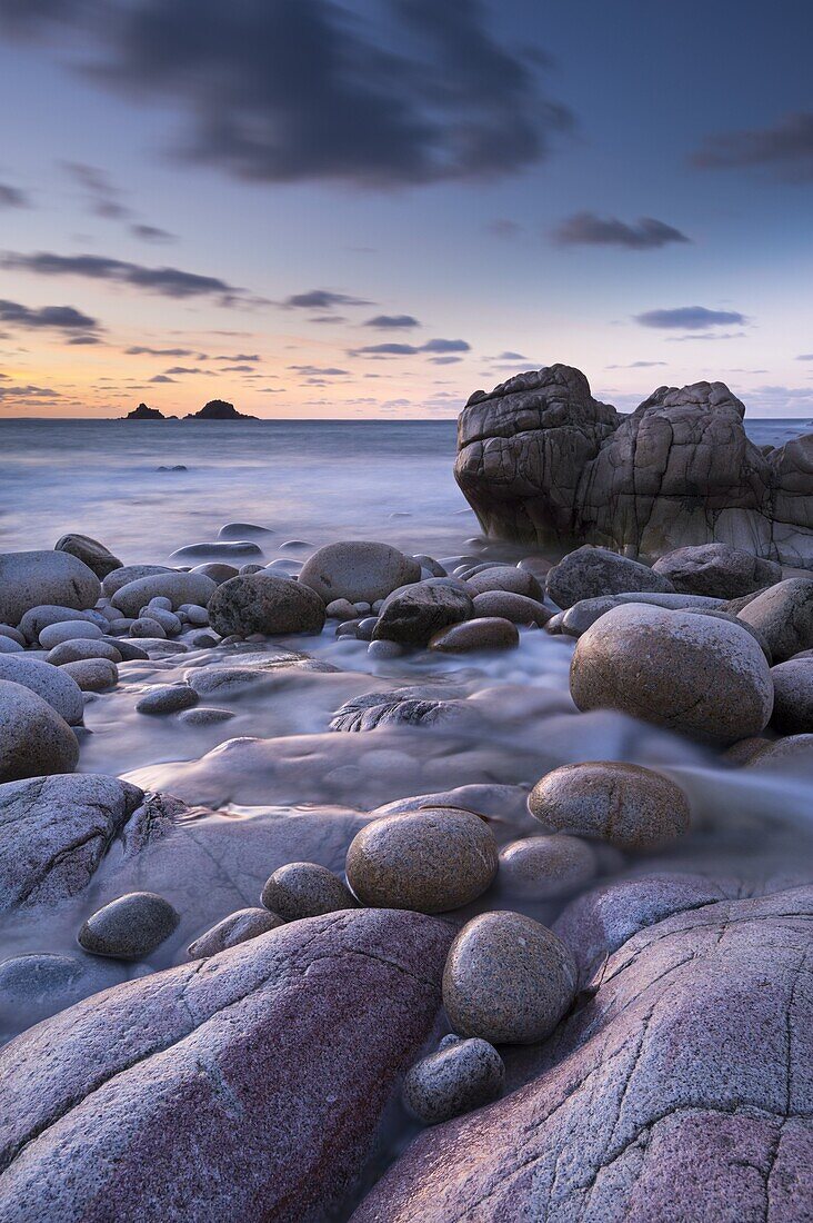 Twilight on the rocky Cornish cove at Porth Nanven, Cornwall, England, United Kingdom, Europe