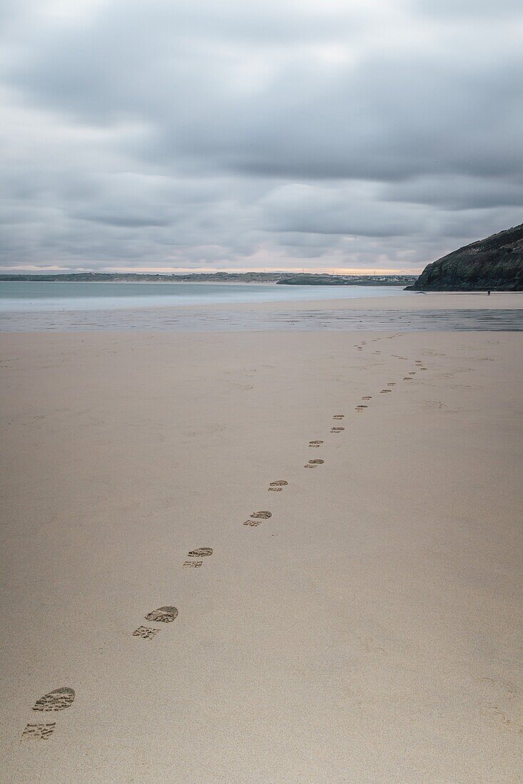 Footsteps in the sand, Carbis Bay beach, St. Ives, Cornwall, England, United Kingdom, Europe