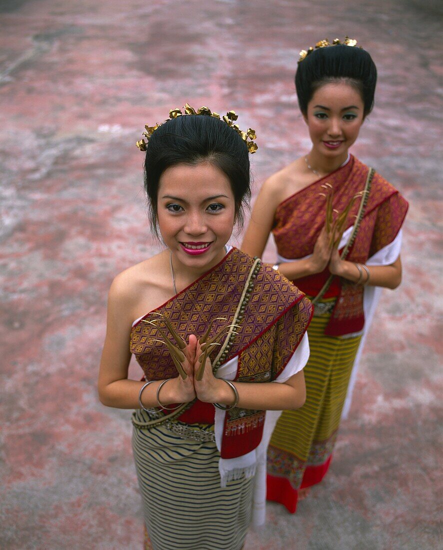 Portrait of two women in traditional Thai costume, Chiang Mai, Thailand, Southeast Asia, Asia