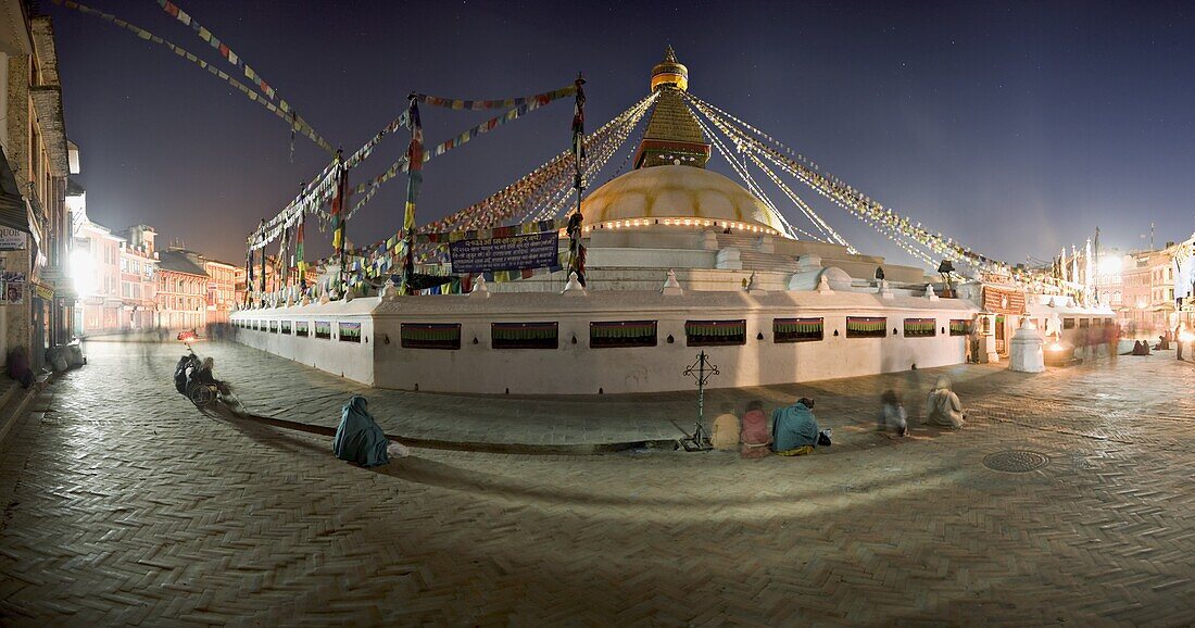 Panoramic image of Boudha, a large Tibetan stupa at Bodhnath, shortly before sunrise on the first day of Lhosar (Tibetan New Year), UNESCO World Heritage Site, Kathmandu, Nepal, Asia