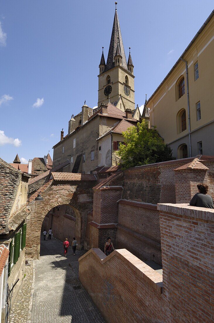 Passageway from the Staircase Tower with the tower of the Evangelical Cathedral in the background, Sibiu, Transylvania, Romania, Europe