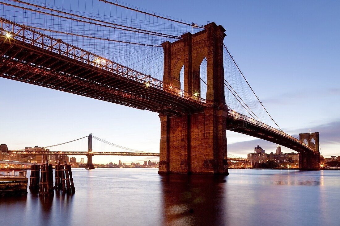 The Brooklyn Bridge spanning the East River between Brooklyn and Manhanttan, New York City, New York, United States of America, North America